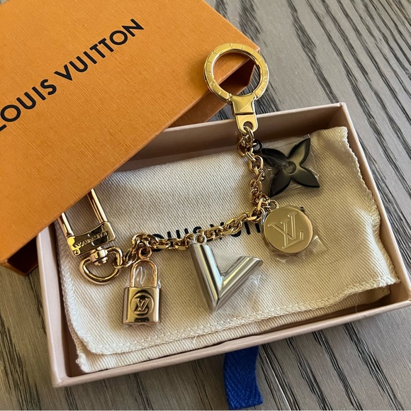 Louis Vuitton Accessories - Louise Vuitton/LV Key chain bag charm with 4 pieces, brand new